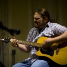 20080111 yellow house  afterparty by sean - 3rd open mic - phil performing guitar (great expressive) smaller.large
